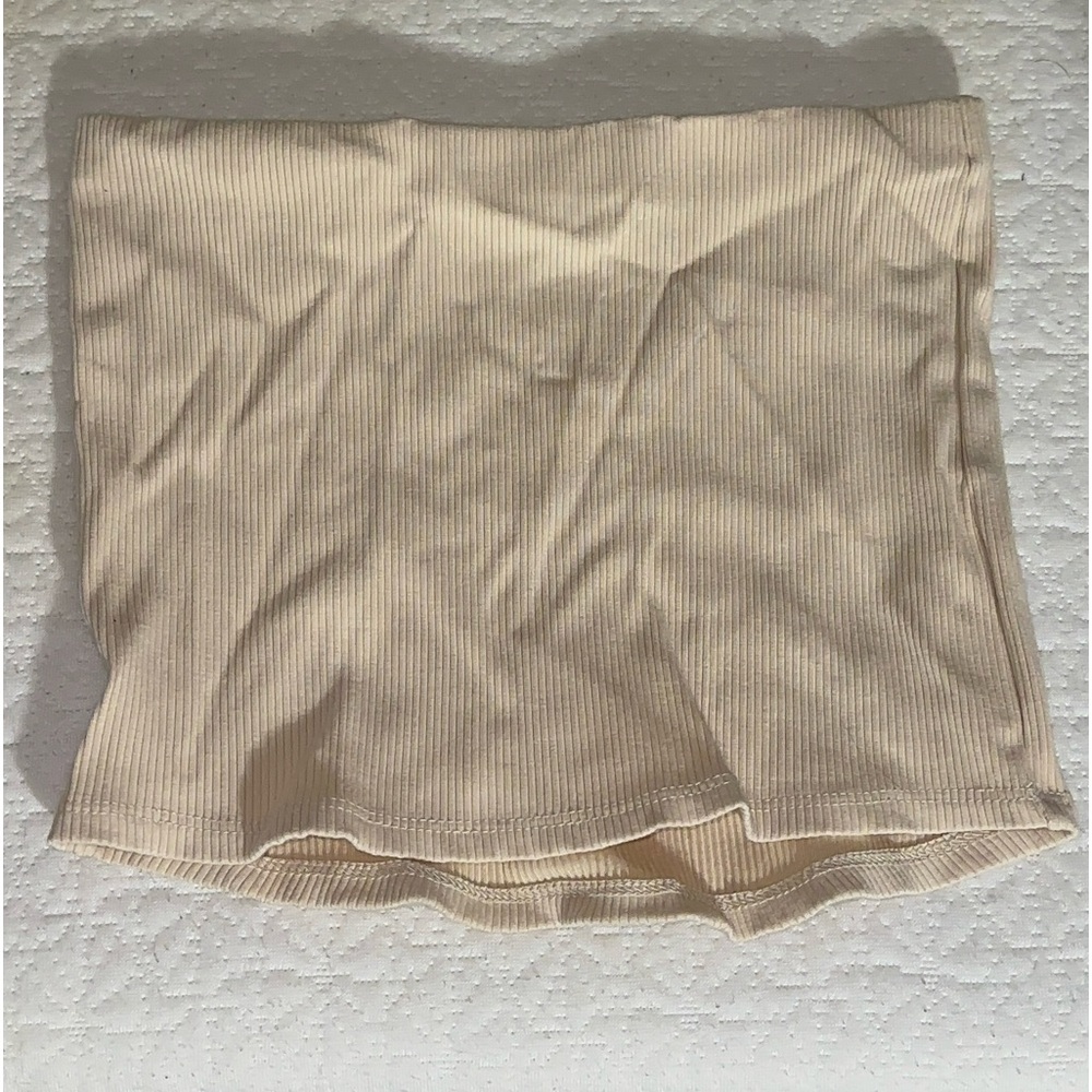 selling a mini micro skirt, size small, cream, from fashion nova